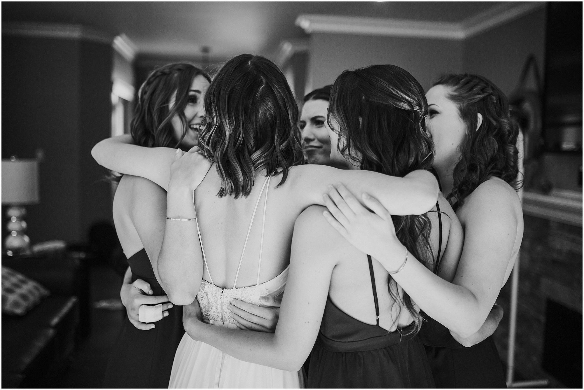 group hug with bridesmaids 